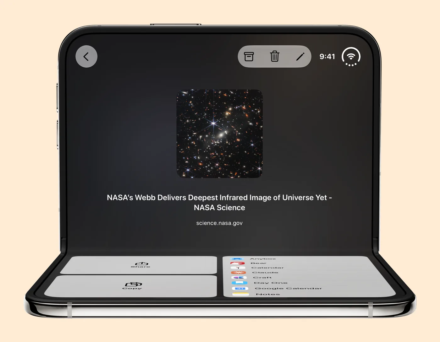 iPhone Duo folded like a laptop, with a saved NASA article on the top half and Share, Copy and export destinations on the bottom half