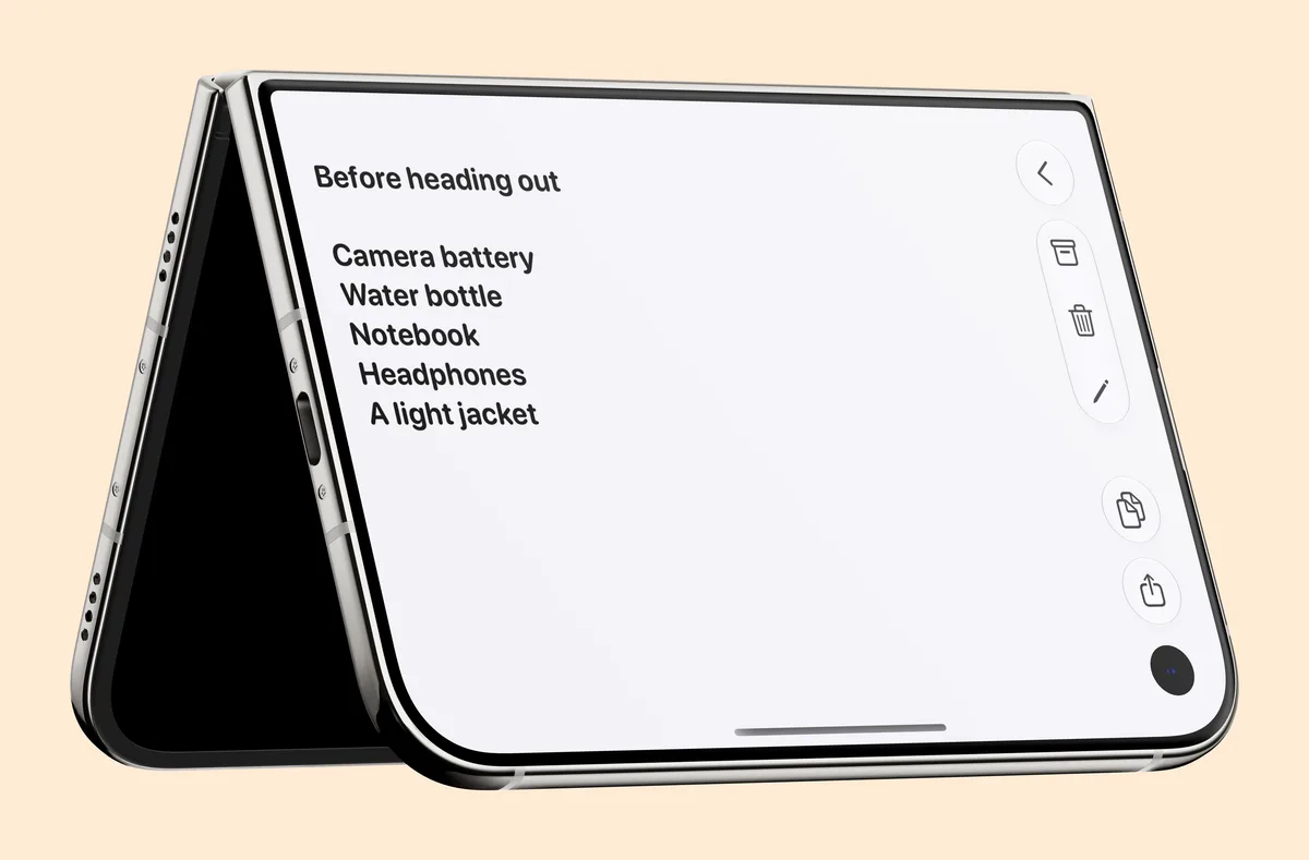 iPhone Duo standing like a tent, with a packing list open on the screen that faces you